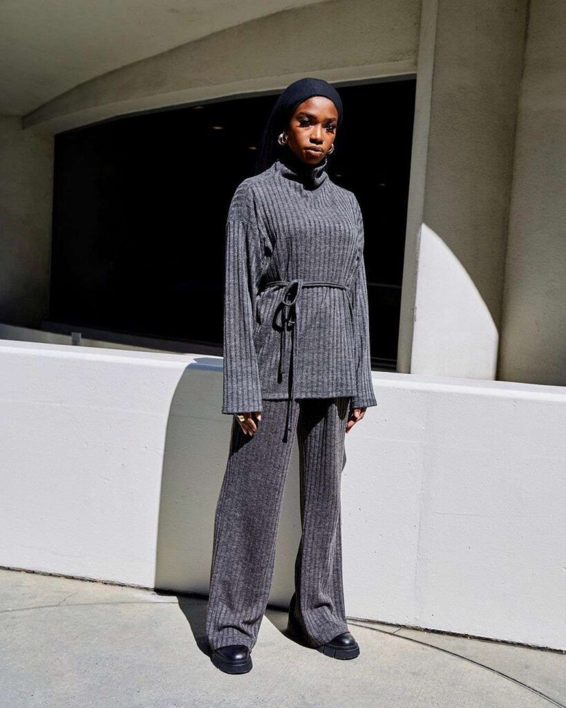 Black girl wearing a grey modest fashion outfit