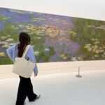 girl looking at art creation