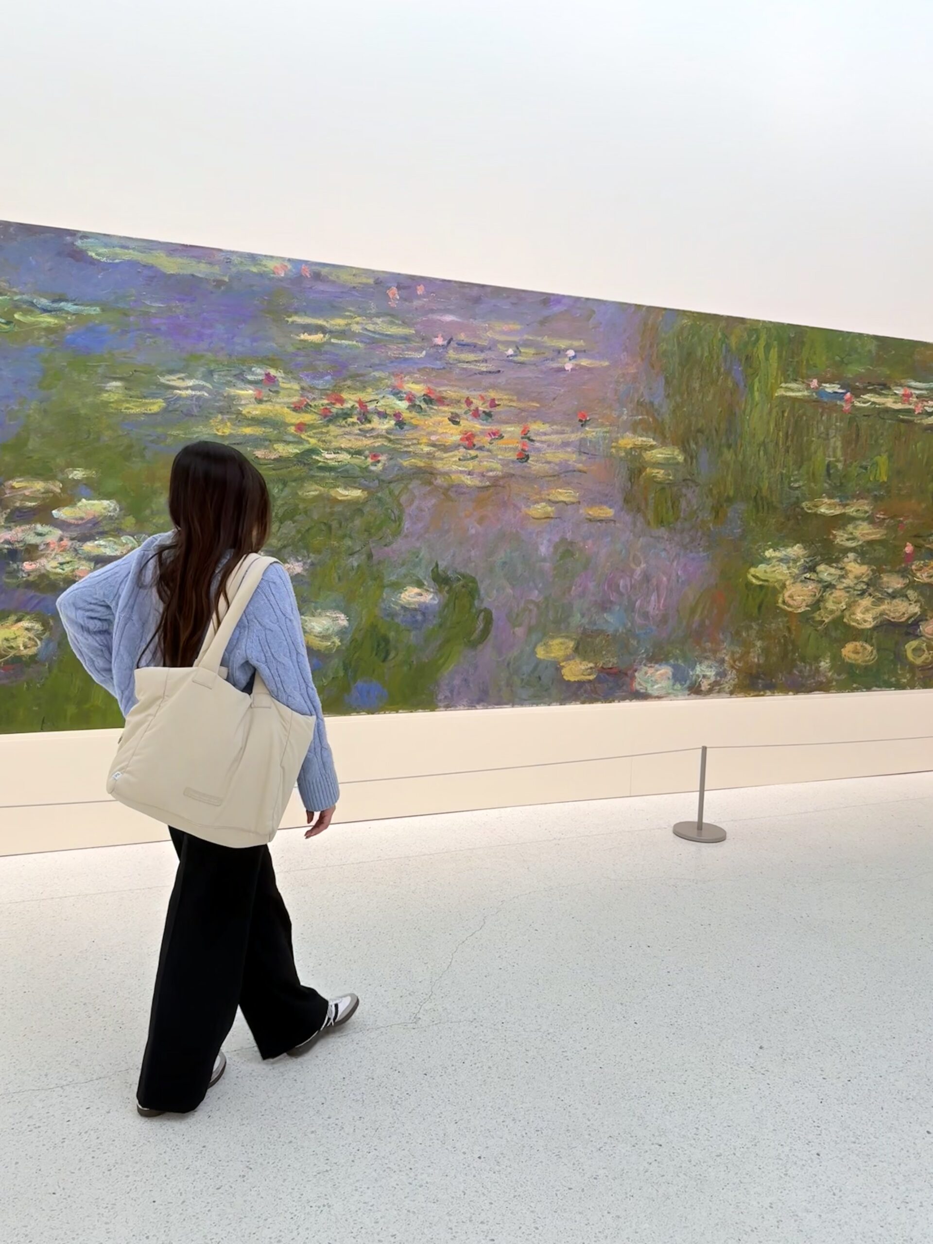 girl looking at art creation